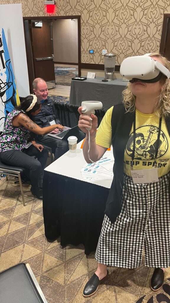 Image of Taylor B. using oculus at WBR event